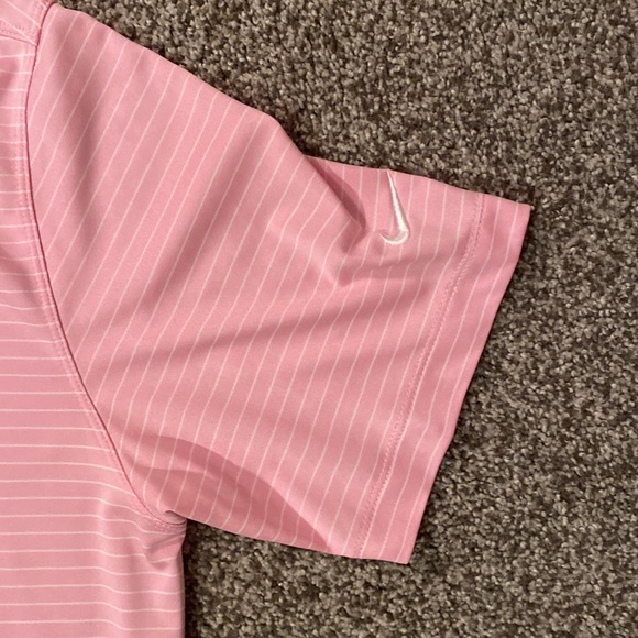 Medium pink and white striped white Nike golf shirt. - Picture 2 of 3